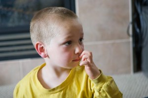 Griffin scratches his nose